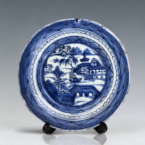 100 - TWO 19TH CENTURY CHINESE PORCELAIN BLUE & WHITE PLATES.
Qing dynasty. 
Painted seaside fishing villa... 