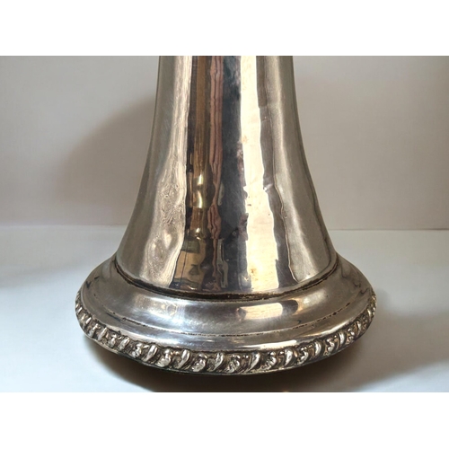 562 - A large silver spill vase.Bow & foliate design.