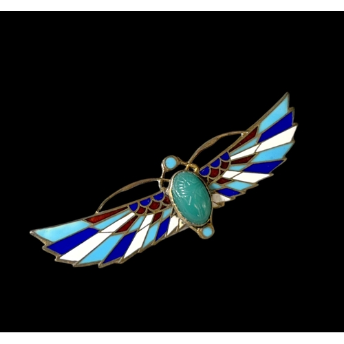 546 - An Egyptian revival Silver gilt & enamel winged scarab beetle brooch.Early 20th century. Stamped... 