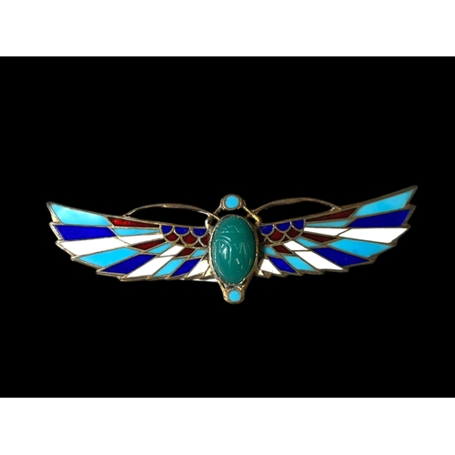 546 - An Egyptian revival Silver gilt & enamel winged scarab beetle brooch.Early 20th century. Stamped... 