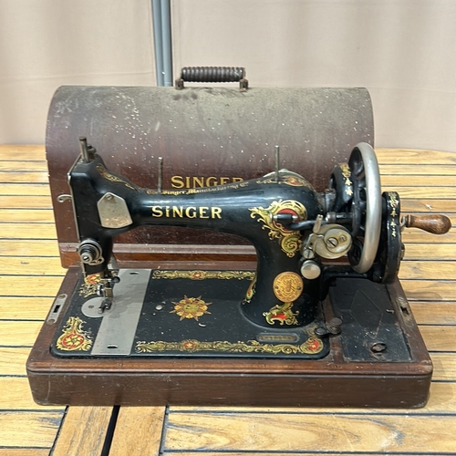 49 - Vintage Singer sewing machine with intricate floral decals and original wooden case, from the early ... 