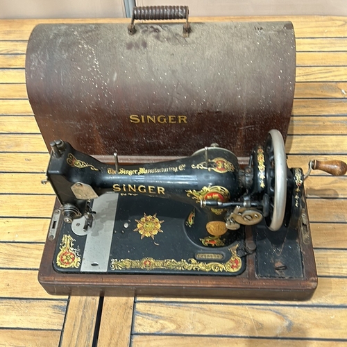 49 - Vintage Singer sewing machine with intricate floral decals and original wooden case, from the early ... 