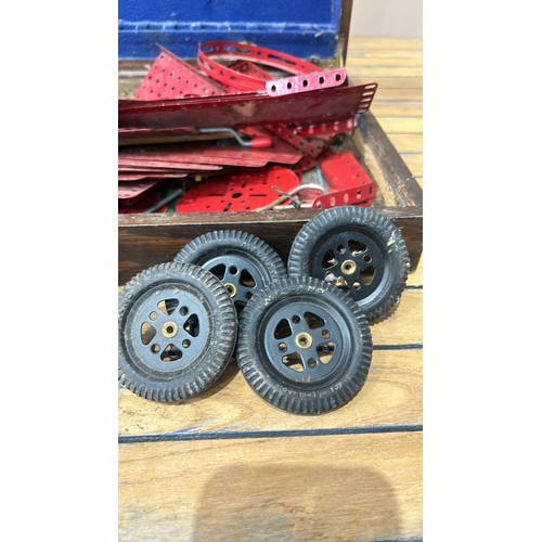 50 - Vintage Meccano construction set includes original metal parts and clockwork motor. The set contains... 