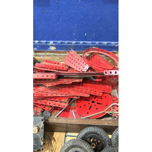 50 - Vintage Meccano construction set includes original metal parts and clockwork motor. The set contains... 