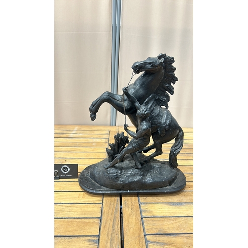 52 - Large Spelter Marley horse equestrian sculpture depicting a rearing horse and rider, inspired by cla... 