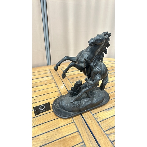 52 - Large Spelter Marley horse equestrian sculpture depicting a rearing horse and rider, inspired by cla... 