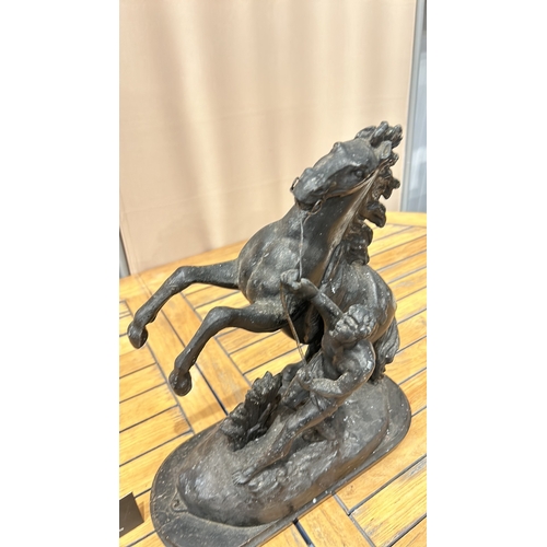 52 - Large Spelter Marley horse equestrian sculpture depicting a rearing horse and rider, inspired by cla... 