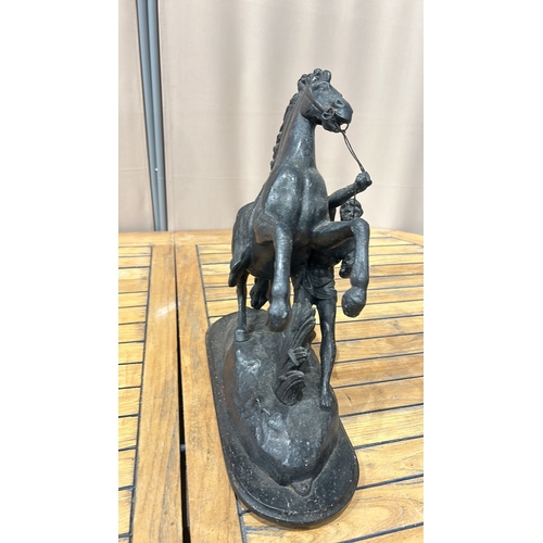 52 - Large Spelter Marley horse equestrian sculpture depicting a rearing horse and rider, inspired by cla... 