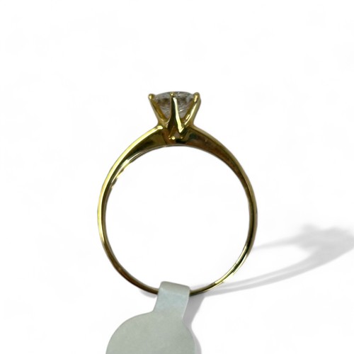 175 - A 9ct Gold and CZ solitaire ring.Size - S 1/2