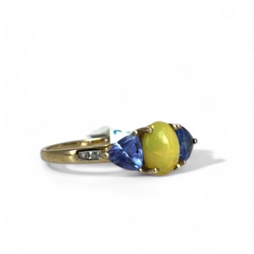 190 - A 9ct Gold, Opal & Tanzanite ring.Accented with diamonds to shoulder.Size - S