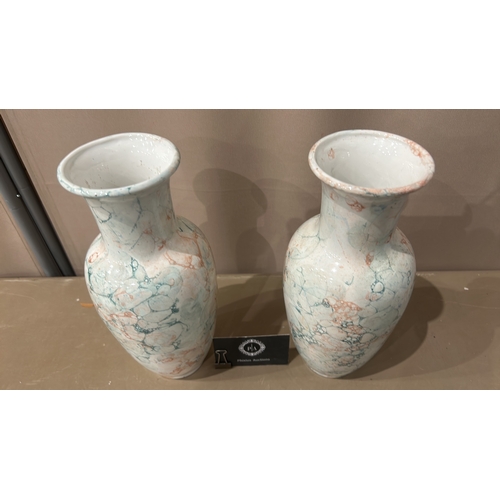 137 - Pair of Chinese vases featuring marbled glaze with blue and red accents. Contemporary design.