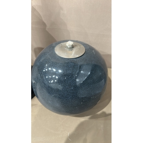 138 - 2 Ceramic oil lamp with a speckled blue glaze finish. Rounded body, with natural clay base, and a Ch... 