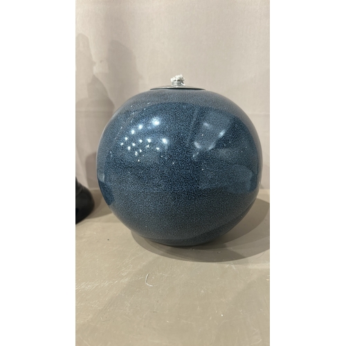 138 - 2 Ceramic oil lamp with a speckled blue glaze finish. Rounded body, with natural clay base, and a Ch... 