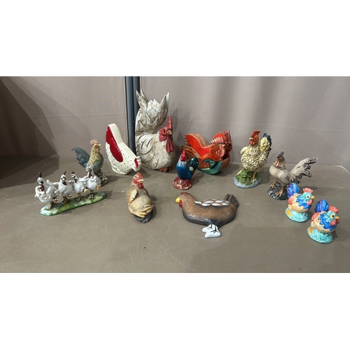 199 - Collection of ceramic chicken figurines, featuring various styles and vibrant colors. Includes a ran... 