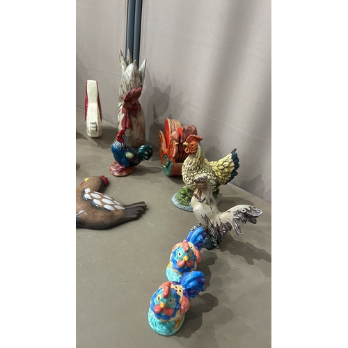 199 - Collection of ceramic chicken figurines, featuring various styles and vibrant colors. Includes a ran... 