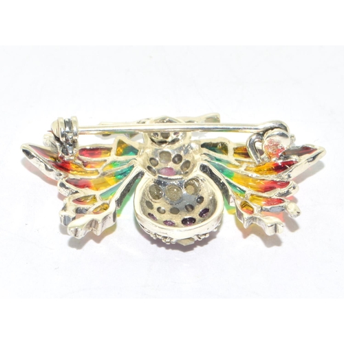 74 - Silver plique a jour brooch set with Ruby Cabachons