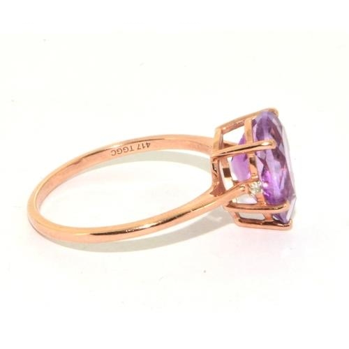 81 - 9ct gold ladies large Amethyst pear shape stone set with Diamond shoulders size R