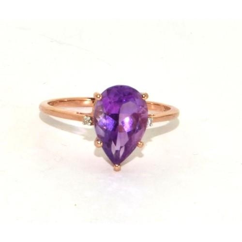 81 - 9ct gold ladies large Amethyst pear shape stone set with Diamond shoulders size R