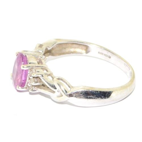 83 - 9ct white gold ladies Pink Tourmaline and Diamond ring on a open work setting size M