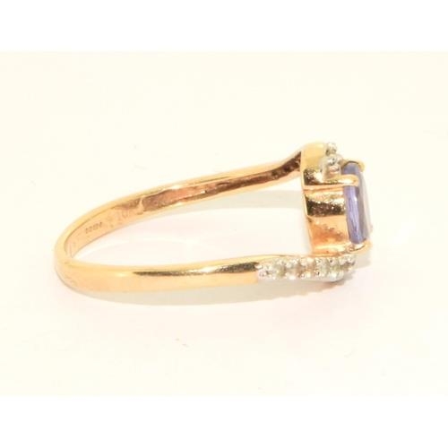 101 - 9ct gold ladies Amethyst twist ring size M