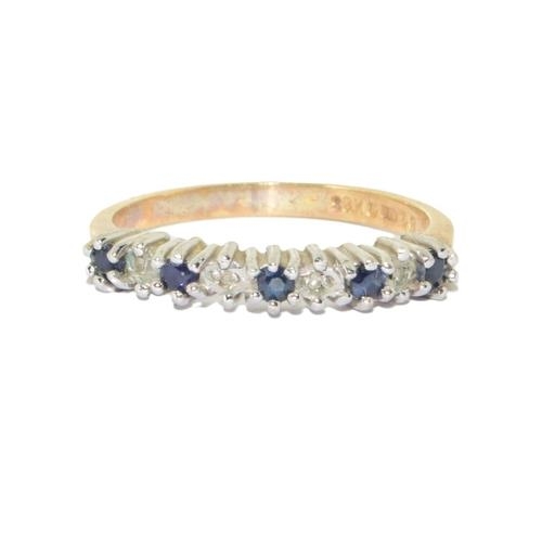 131 - 9ct gold 9 stone Diamond and Sapphire ring size L