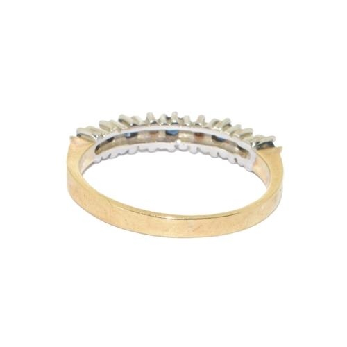 131 - 9ct gold 9 stone Diamond and Sapphire ring size L