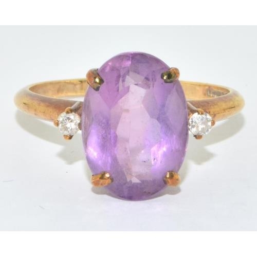 133 - 9ct gold ladies Amethyst statement ring set with Diamond to the shoulders size R