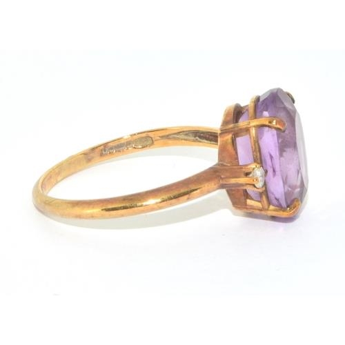 133 - 9ct gold ladies Amethyst statement ring set with Diamond to the shoulders size R