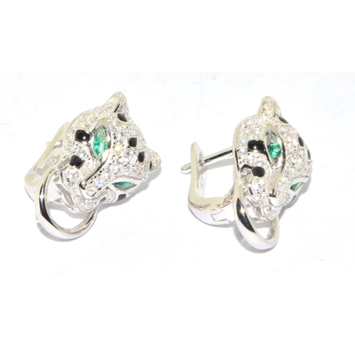 149 - Pair silver designer earrings with emerald eyes