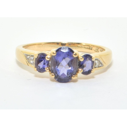 166 - 9ct gold ladies Tanzanite and Diamond ring size L