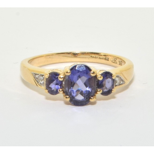 166 - 9ct gold ladies Tanzanite and Diamond ring size L