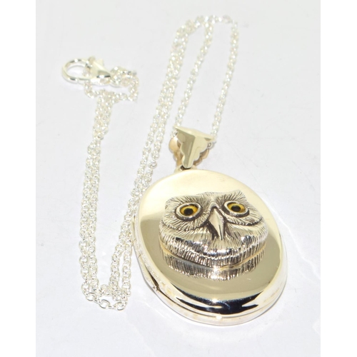 299 - Silver photo locket necklace set with a lucky owl