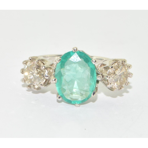 321 - Substantial 18ct white gold Emerald and Diamond  three stone ring  of approx 5.5cts size O