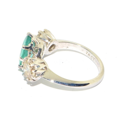 321 - Substantial 18ct white gold Emerald and Diamond  three stone ring  of approx 5.5cts size O