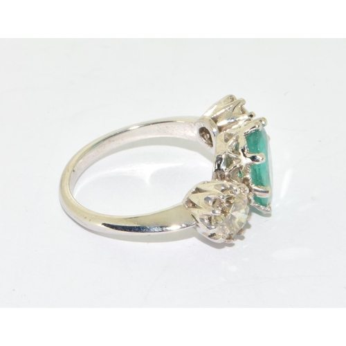 321 - Substantial 18ct white gold Emerald and Diamond  three stone ring  of approx 5.5cts size O