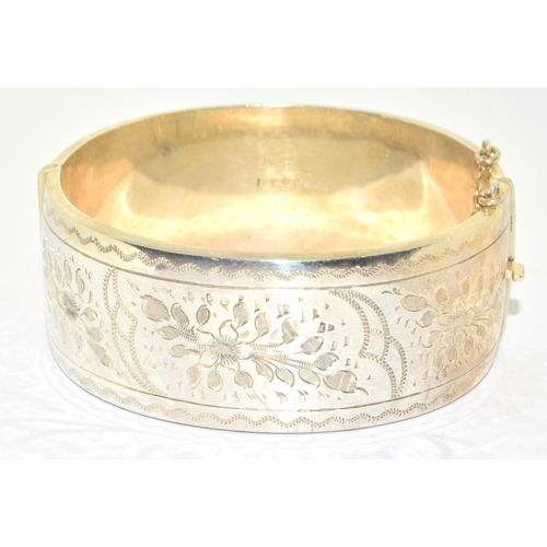 322 - Large 925 silver Embossed solid bangle with safety chain 7cm diameter 2.5cm wide 65grm