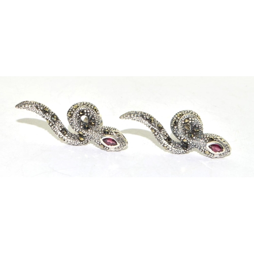 327 - Pair of marcasite snake earrings with garnet eyes