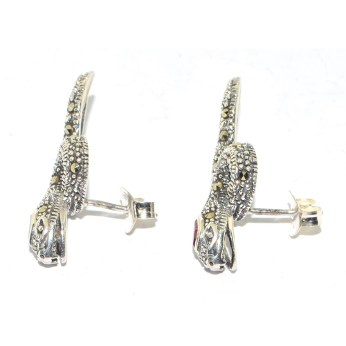 327 - Pair of marcasite snake earrings with garnet eyes