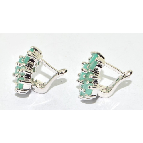 332 - Pair silver and emerald cluster earrings