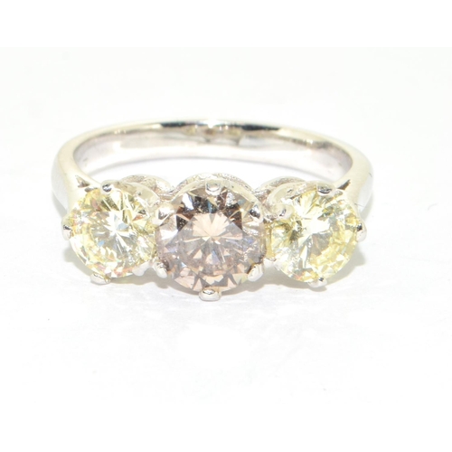 341 - Unusual 18ct three stone diamond ring with the centre stone being cognac and total of approx 2cts si... 