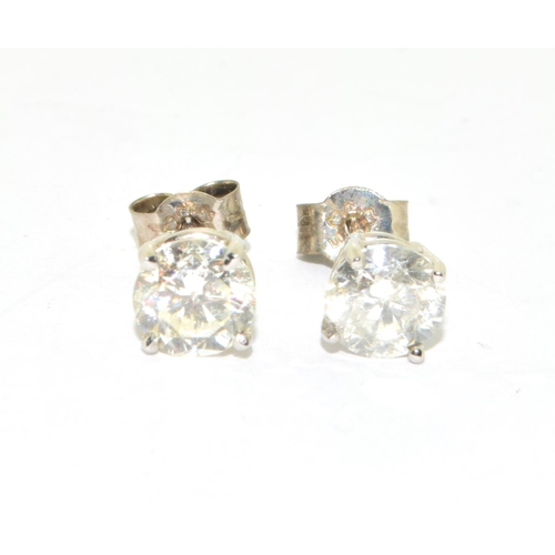 348 - Pair of clear 14ct white gold Diamond stud earrings of approx 1.65cts