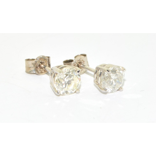 348 - Pair of clear 14ct white gold Diamond stud earrings of approx 1.65cts