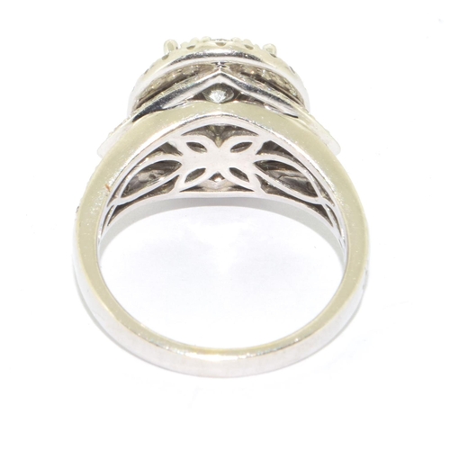 374 - 14ct white gold ladies diamond statement ring the main oval design hallowed by a ring of further dia... 