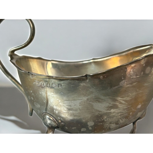 622 - A collection of sterling silver.Including a Mappin & Webb silver bowl, gravy boat and milk jug. ... 