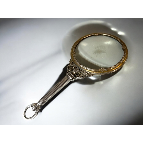 624 - A French Emile Langlois silver parcel-gilt magnifying glass.Late 19th century.Length - 18.5cm... 