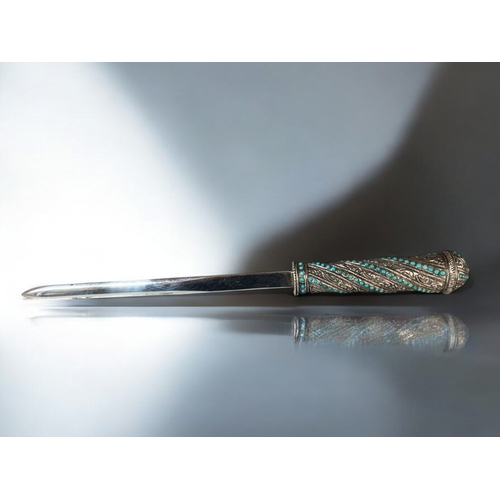 625 - A Silver bladed & handle letter opener.London hallmarks & makers marks to blade. The handle ... 