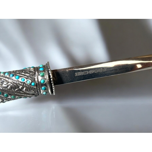 625 - A Silver bladed & handle letter opener.London hallmarks & makers marks to blade. The handle ... 