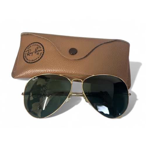 287 - Four pairs of Ray Ban sunglasses, with cases.