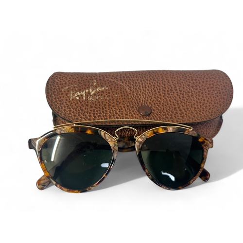 287 - Four pairs of Ray Ban sunglasses, with cases.