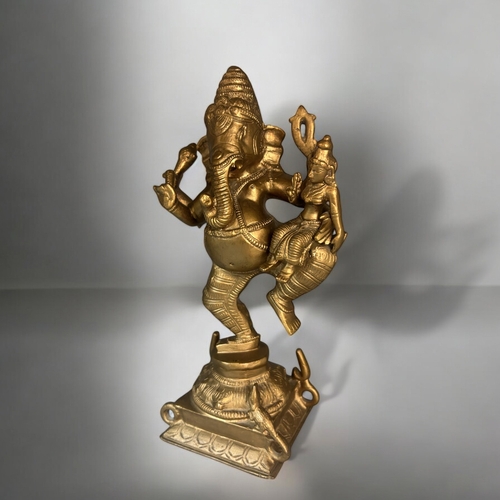 617 - A large Bronze figure of dancing Ganesh.Early 20th century.Re-gilded. Height - 29.5cm... 